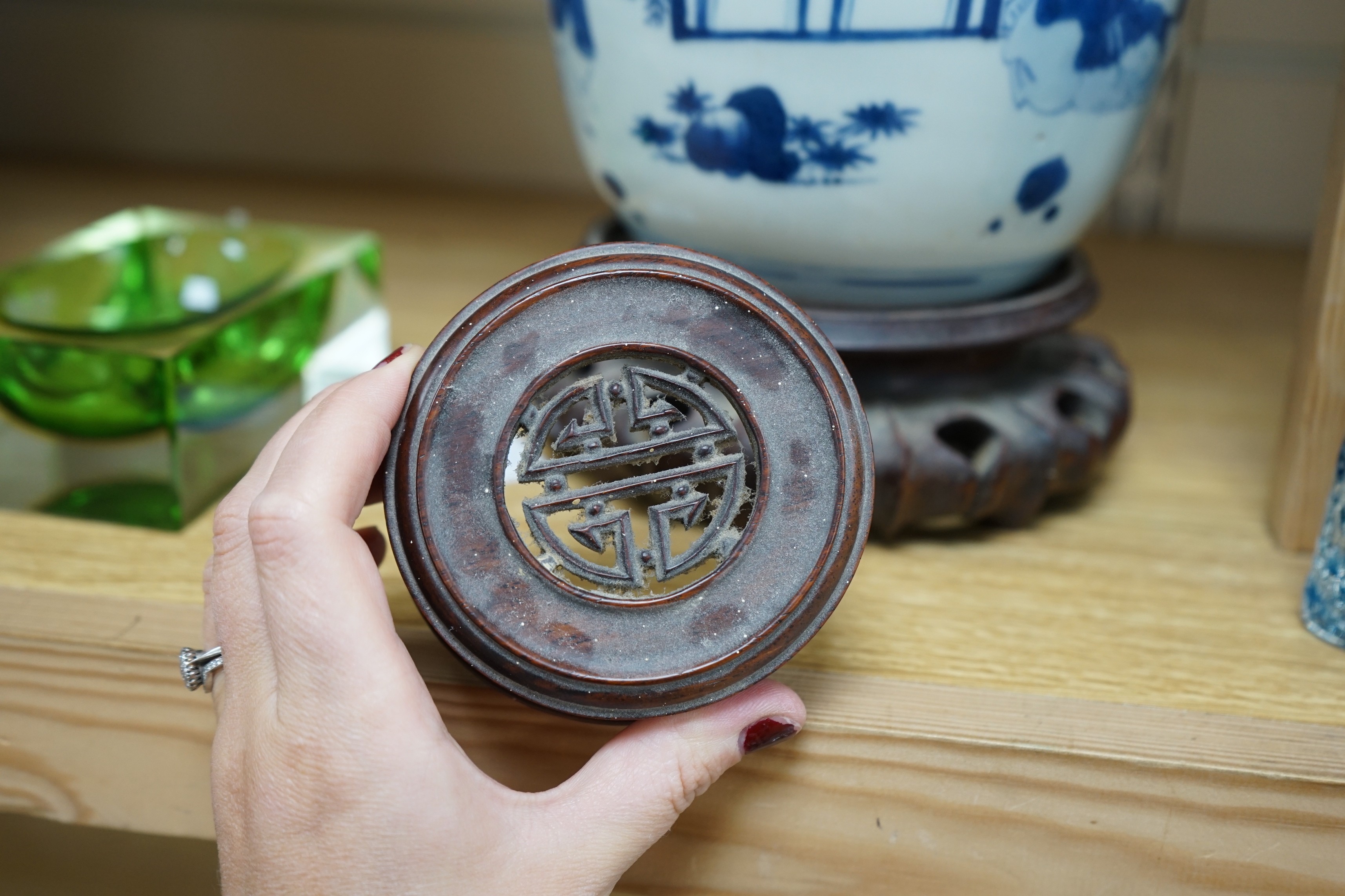 A Chinese blue and white 'boys' jar, 19th century, wood cover and stand, total height 24cm high